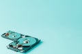 Hard disk drives opened on a blue background Royalty Free Stock Photo