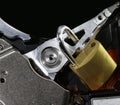 Hard disk with an open padlock as a concept for computer data se Royalty Free Stock Photo