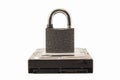 Hard disk and padlock on a white background. The lock is locked Royalty Free Stock Photo