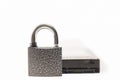 Hard disk and padlock on a white background. The lock is locked Royalty Free Stock Photo