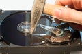 Hard drive being destroyed with hammer Royalty Free Stock Photo