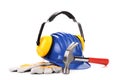 Hard hat and ear muffs hammer. Royalty Free Stock Photo