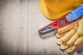 Hard hat protective gloves construction level blue rolled up eng Royalty Free Stock Photo