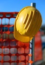 Hard hat on the road construction site and a safety net Royalty Free Stock Photo