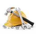 Hard hat and tools hammer wrench nuts for construction repair and maintenance Royalty Free Stock Photo