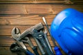 Hard hat with various working tools Royalty Free Stock Photo