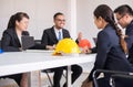 Hard hats safety helmet in meeting room,Blured of people architect and engineer at office