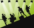 Hard Rock band silhouette on stage. Action angle with searchlights. Royalty Free Stock Photo