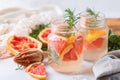 Hard seltzer cocktail with grapefruit and rosemary