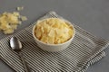 Hard Shaved Parmesan Cheese in a Bowl, side view Royalty Free Stock Photo
