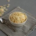 Hard Shaved Parmesan Cheese in a Bowl, side view Royalty Free Stock Photo
