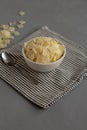 Hard Shaved Parmesan Cheese in a Bowl, side view Royalty Free Stock Photo
