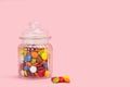 Hard shell chocolate candies in a crystal jar Royalty Free Stock Photo