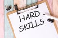 HARD SKILLS text written on notebook page. office desk table top view