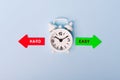 hard vs easy. Red arrow and green arrow- direction indicator - choice of hard or easy. Concept of choice. Two Arrows and White Royalty Free Stock Photo