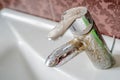 Hard water deposit on a tap Royalty Free Stock Photo