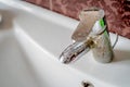 Hard water deposit on a tap Royalty Free Stock Photo