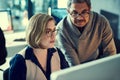 Hard work is the baseline for success. two businesspeople working late in an office. Royalty Free Stock Photo