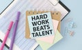 Hard Work Beats Talent written on color sticky notes Royalty Free Stock Photo