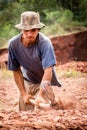 Santa Maria de Fe, Misiones, Paraguay - Hard Work of the Young Miner Man Breaking Red Stone