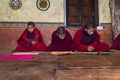 Hard working Bhutanese novice monks learning the Buddhism text in early morning, Bhutan.