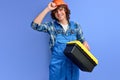 responsible hard working cheerful engineer holding tool box having working day Royalty Free Stock Photo