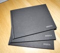 Hardback dark grey cloth covered books