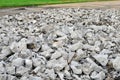 Hardcore waste recycling. Broken concrete slabs at construction site. oncrete rubble from demolition at landfill.  Recycling and Royalty Free Stock Photo