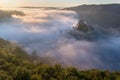 Hardegg medieval castle on a fortified hill upon Thaya river during summer or autumn time. Misty big ruins in the Thayatal Valley.