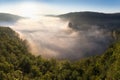 Hardegg medieval castle on a fortified hill upon Thaya river during summer or autumn time. Misty big ruins in the Thayatal Valley. Royalty Free Stock Photo