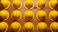 Hardhats on a wooden table. Top view background.