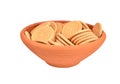 Hardtack cookie in clay bowl