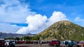 Hardtop cars are parked, used for tourist transportation in the Bromo Tengger Semeru National Park area, Indonesia.