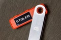 hardware Bitcoin wallet with message Stolen on screen Royalty Free Stock Photo