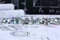 Hardware bolts and nuts on paper engineering drawings