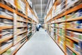 Hardware construction supermarket aisle and shelves. Perspective view of hypermarket rows with products. Blurred Royalty Free Stock Photo