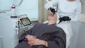 YAG laser for facial therapy at cosmetology clinic