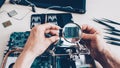 Hardware diagnostics microcircuits magnifier Royalty Free Stock Photo