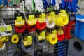 Hardware store. Rack with goods. Trimmer line. Colorful trimmer line cord in warehouse