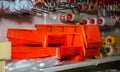 In a hardware store, on a shelf, there is a tray for a roller and paint and equipment for painting works Belarus, Minsk, January