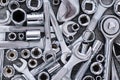 Hardware Tools, adjustable wrench, socket wrench, Sockets on wood background, top view, flat lay