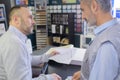 hardwarer store worker with craftsman buyer Royalty Free Stock Photo