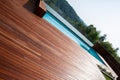 Hardwood decking around the Infinity swimming pool with safe fence overlooking nature