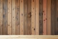 Hardwood table top in front of raintree wooden wall Royalty Free Stock Photo