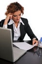 Hardworking Business Woman at Her Desk