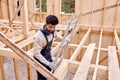 man contractor in work uniform go down the ladder after finished work Royalty Free Stock Photo