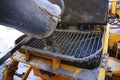 Hardworking laborer and truck-concrete mixer Royalty Free Stock Photo