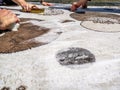 Hardworking people cleaning and scrubbing and cleaning the carpet rug with brush and bubbly soap detergent by hand, cleaning and