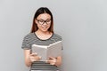 Hardworking student woman reading book isolated