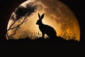 Hare Silhouette with full moon on landscape background